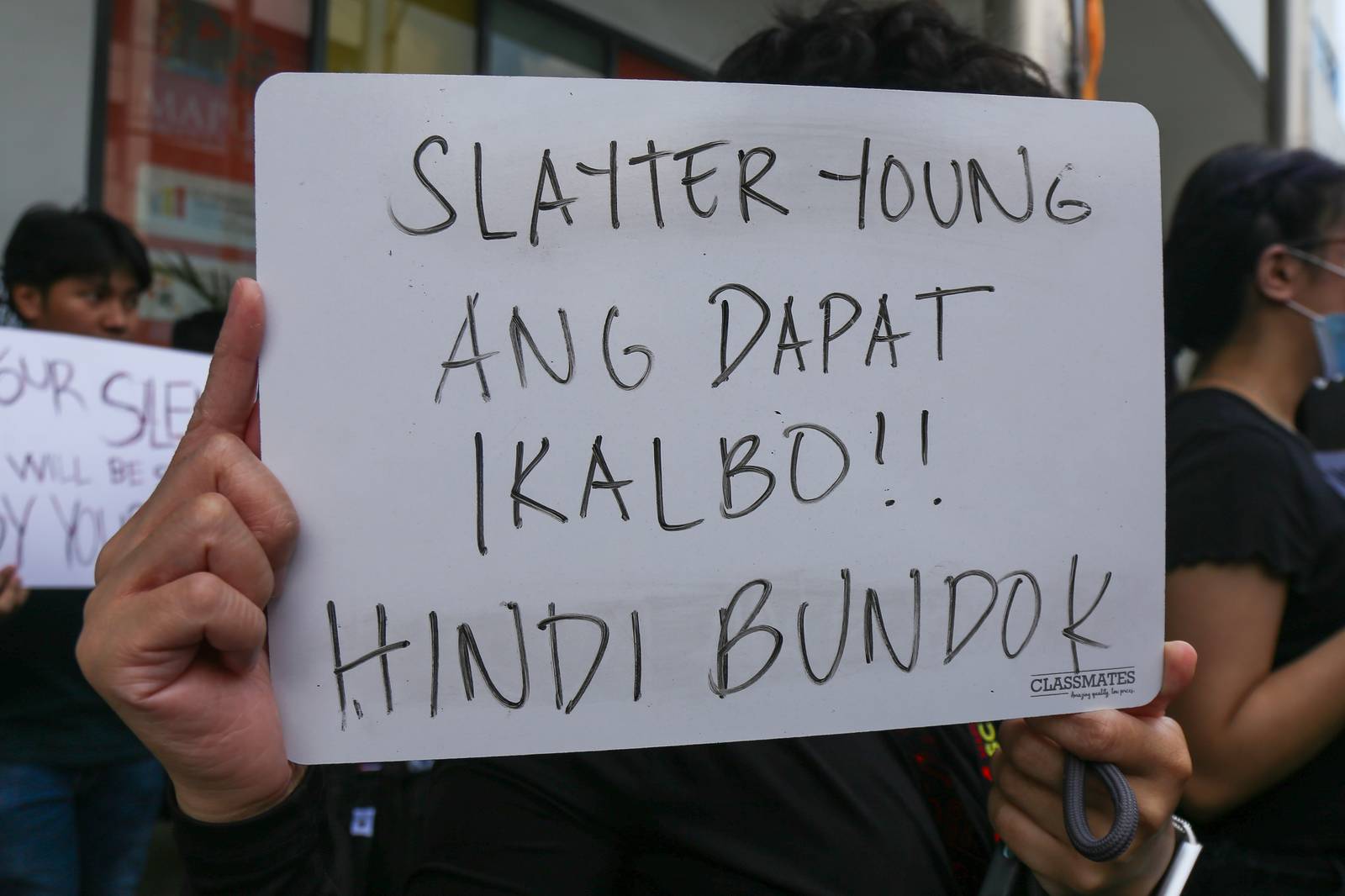 Students from Mapua University in Makati gather outside their campus in Pablo Ocampo Sr. Extension on 13 November 2025 as they call for justice and accountability from all officials and contractors involved in corruption.