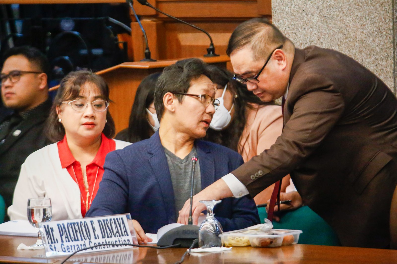 Pacifico and Cezarah Discaya return to the Senate Blue Ribbon Committee hearing after being allowed earlier in the day to retrieve the controversial ledger said to contain names, dates, and amounts allegedly received by House lawmakers and DPWH officials linked to the flood control scandal.