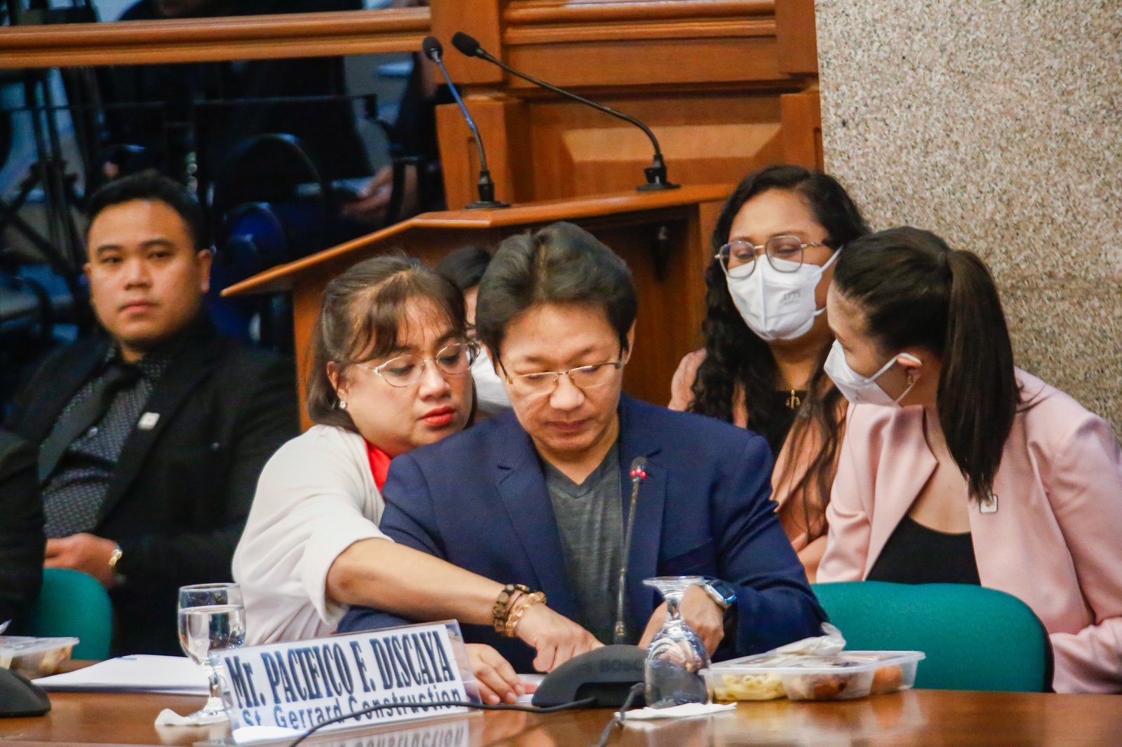 Pacifico and Cezarah Discaya return to the Senate Blue Ribbon Committee hearing after being allowed earlier in the day to retrieve the controversial ledger said to contain names, dates, and amounts allegedly received by House lawmakers and DPWH officials linked to the flood control scandal.