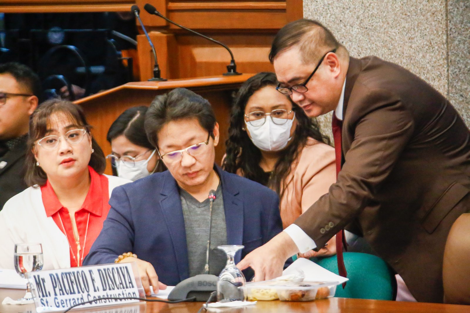 Pacifico and Cezarah Discaya return to the Senate Blue Ribbon Committee hearing after being allowed earlier in the day to retrieve the controversial ledger said to contain names, dates, and amounts allegedly received by House lawmakers and DPWH officials linked to the flood control scandal.