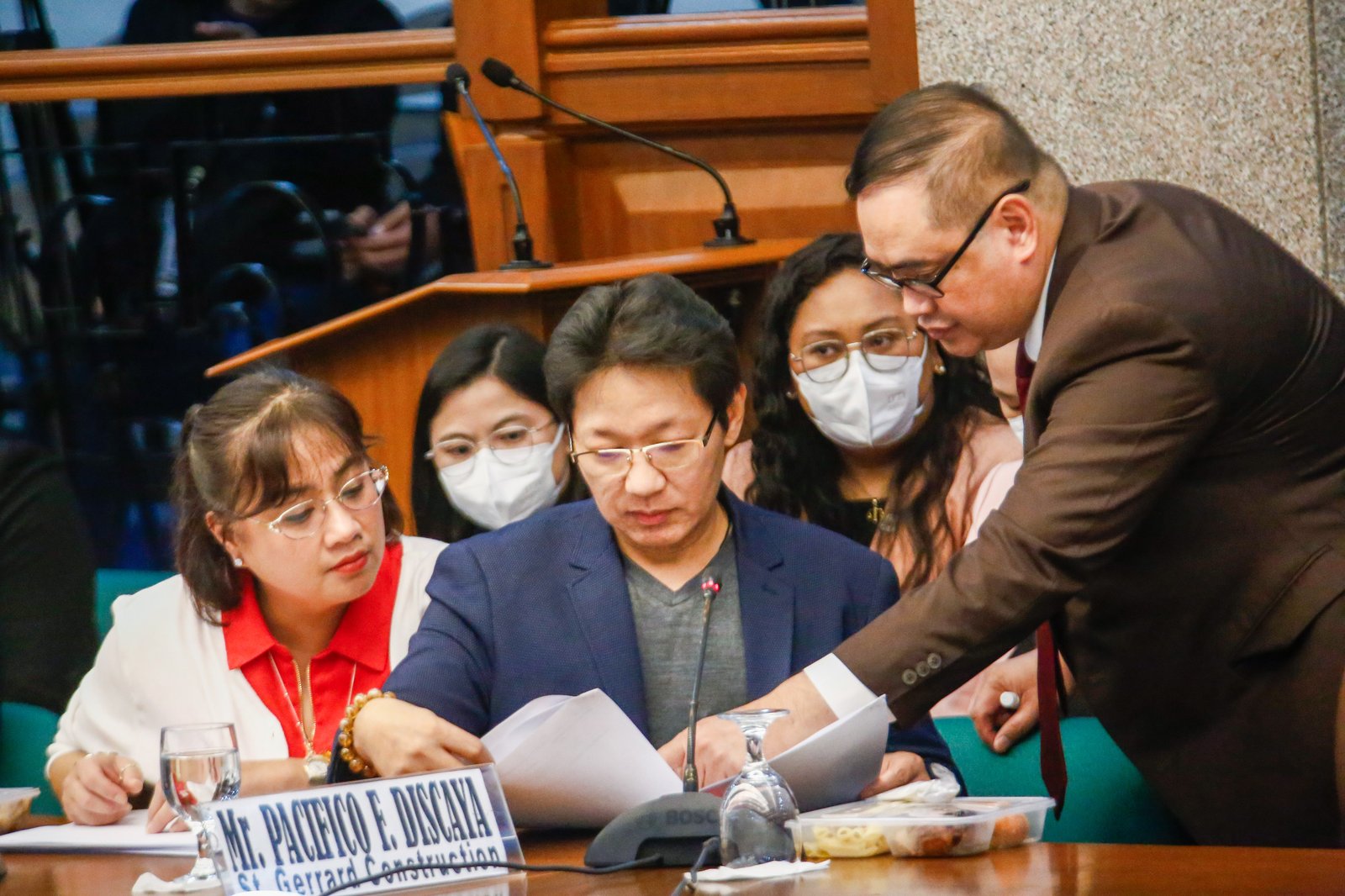 Pacifico and Cezarah Discaya return to the Senate Blue Ribbon Committee hearing after being allowed earlier in the day to retrieve the controversial ledger said to contain names, dates, and amounts allegedly received by House lawmakers and DPWH officials linked to the flood control scandal.