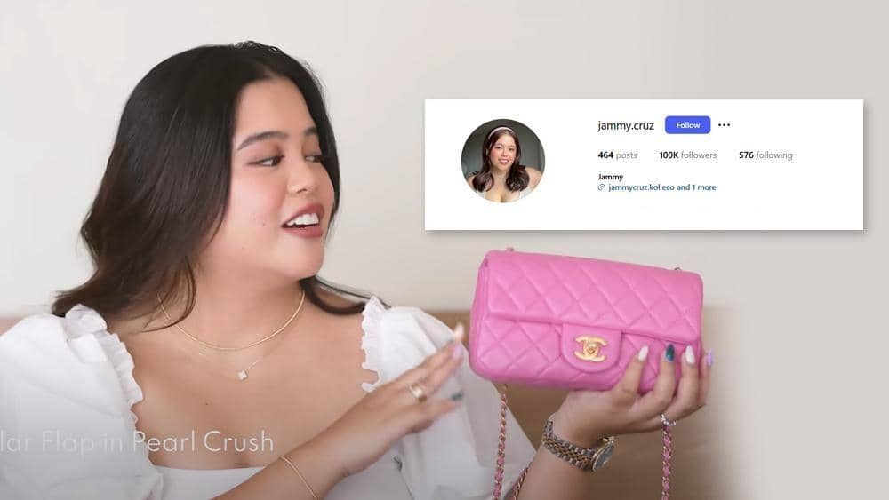 Jammy Cruz shows off a luxury bag.