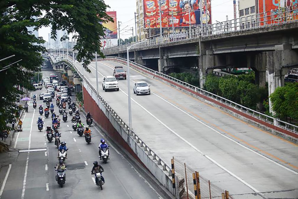 MPV crashes into QC post