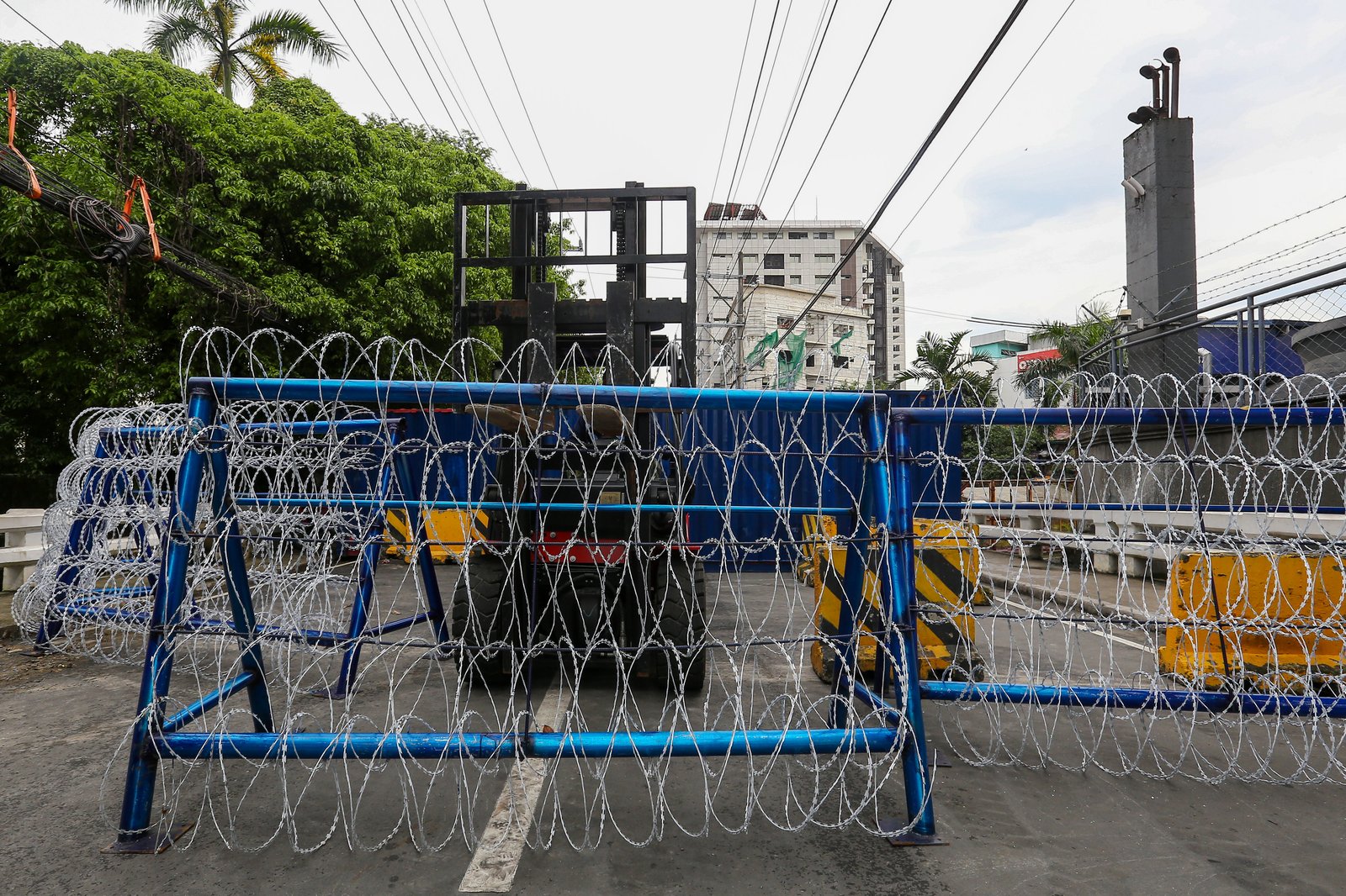 Police personnel install razor wires, concrete barriers, and container vans in various streets leading towards Malacañang compound in Manila on 15 November 2025, in preparation for the upcoming anti-corruption protests.

The following streets, General Solano, Nicanor Padilla, Arlegui, and Mendiola, are no longer accessible to motorists.