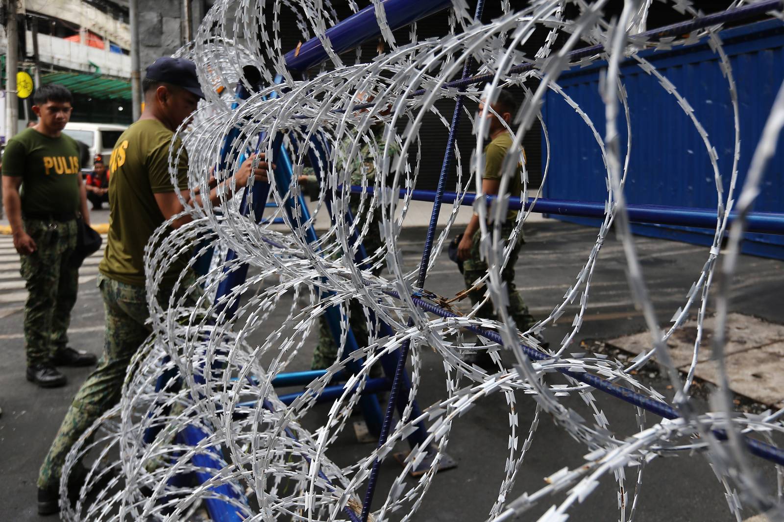 Police personnel install razor wires, concrete barriers, and container vans in various streets leading towards Malacañang compound in Manila on 15 November 2025, in preparation for the upcoming anti-corruption protests.

The following streets, General Solano, Nicanor Padilla, Arlegui, and Mendiola, are no longer accessible to motorists.
