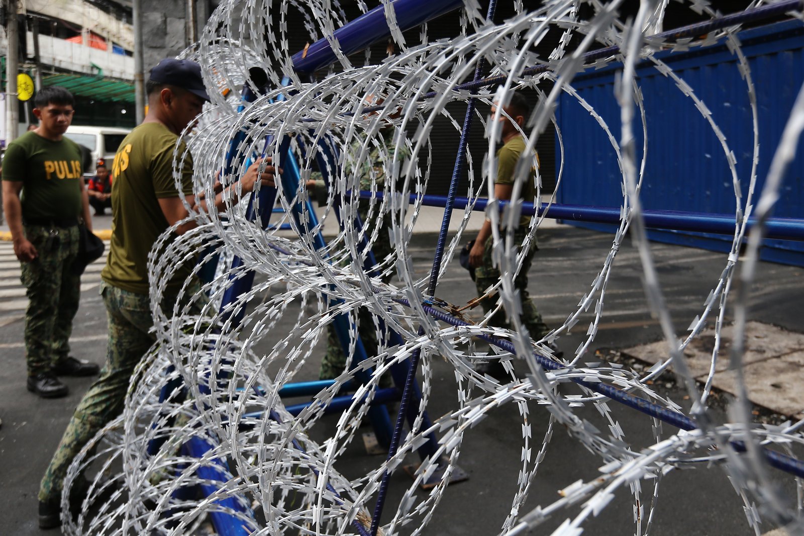 Police personnel install razor wires, concrete barriers, and container vans in various streets leading towards Malacañang compound in Manila on 15 November 2025, in preparation for the upcoming anti-corruption protests.

The following streets, General Solano, Nicanor Padilla, Arlegui, and Mendiola, are no longer accessible to motorists.
