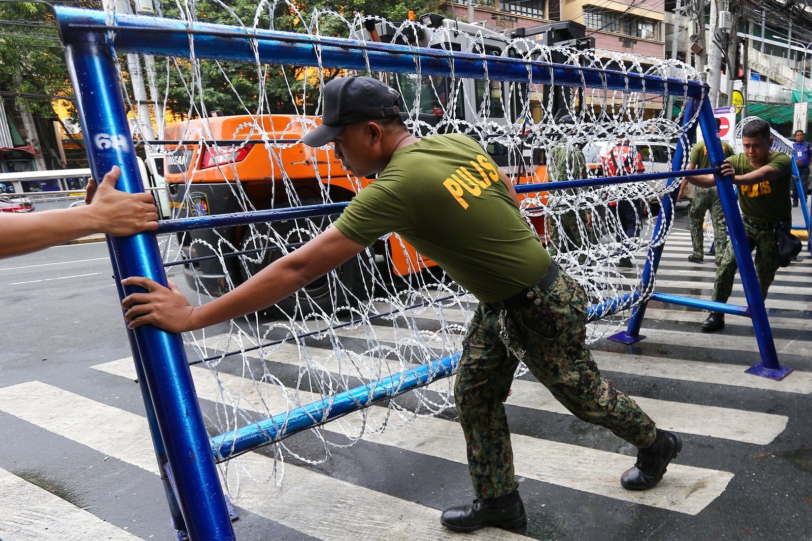 Police personnel install razor wires, concrete barriers, and container vans in various streets leading towards Malacañang compound in Manila on 15 November 2025, in preparation for the upcoming anti-corruption protests.

The following streets, General Solano, Nicanor Padilla, Arlegui, and Mendiola, are no longer accessible to motorists.