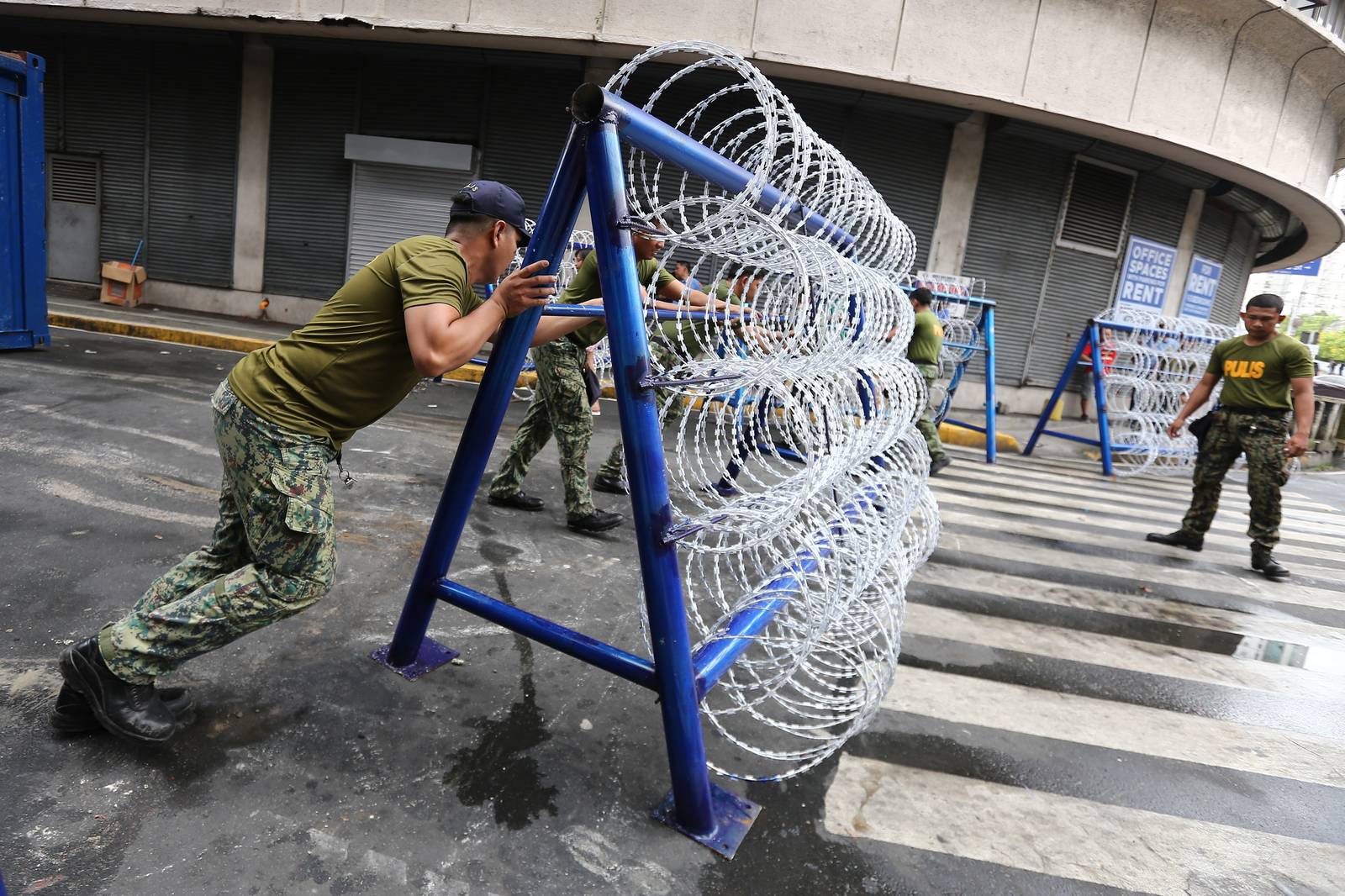 Police personnel install razor wires, concrete barriers, and container vans in various streets leading towards Malacañang compound in Manila on 15 November 2025, in preparation for the upcoming anti-corruption protests.

The following streets, General Solano, Nicanor Padilla, Arlegui, and Mendiola, are no longer accessible to motorists.