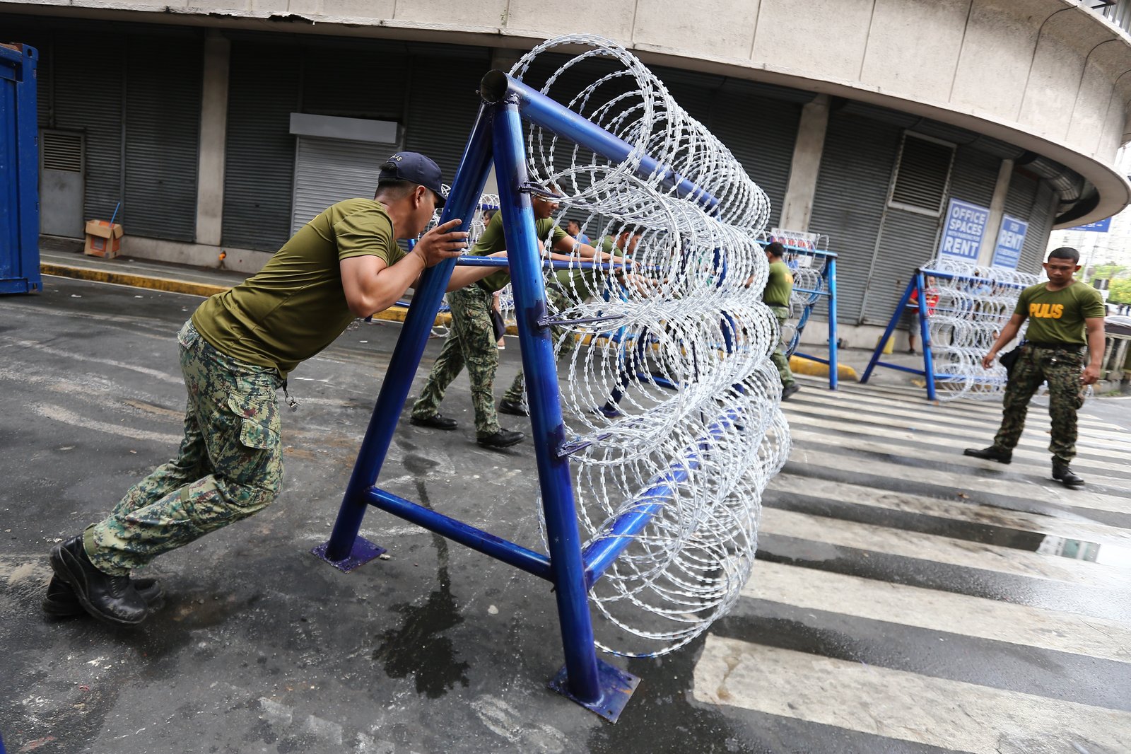 Police personnel install razor wires, concrete barriers, and container vans in various streets leading towards Malacañang compound in Manila on 15 November 2025, in preparation for the upcoming anti-corruption protests.

The following streets, General Solano, Nicanor Padilla, Arlegui, and Mendiola, are no longer accessible to motorists.