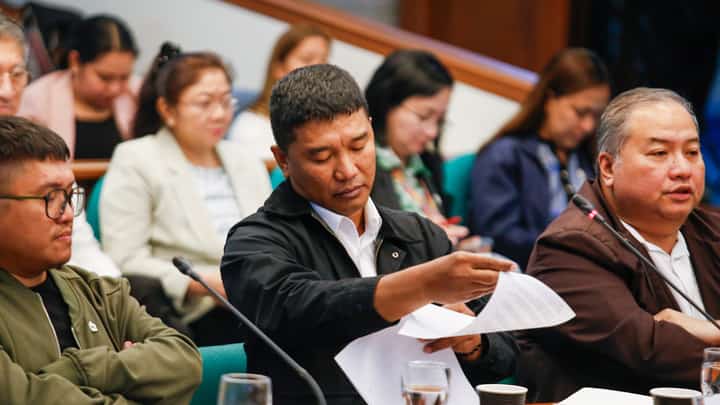 Basura hunt Orly Regala Guteza (middle), a former security consultant for Ako Bicol Partylist Representative Zaldy Co, appears at the Senate Blue Ribbon Committee hearing on 25 September 2025. ‘Basura’ was the term Regala and his team used to refer to luggage containing illicit funds.
