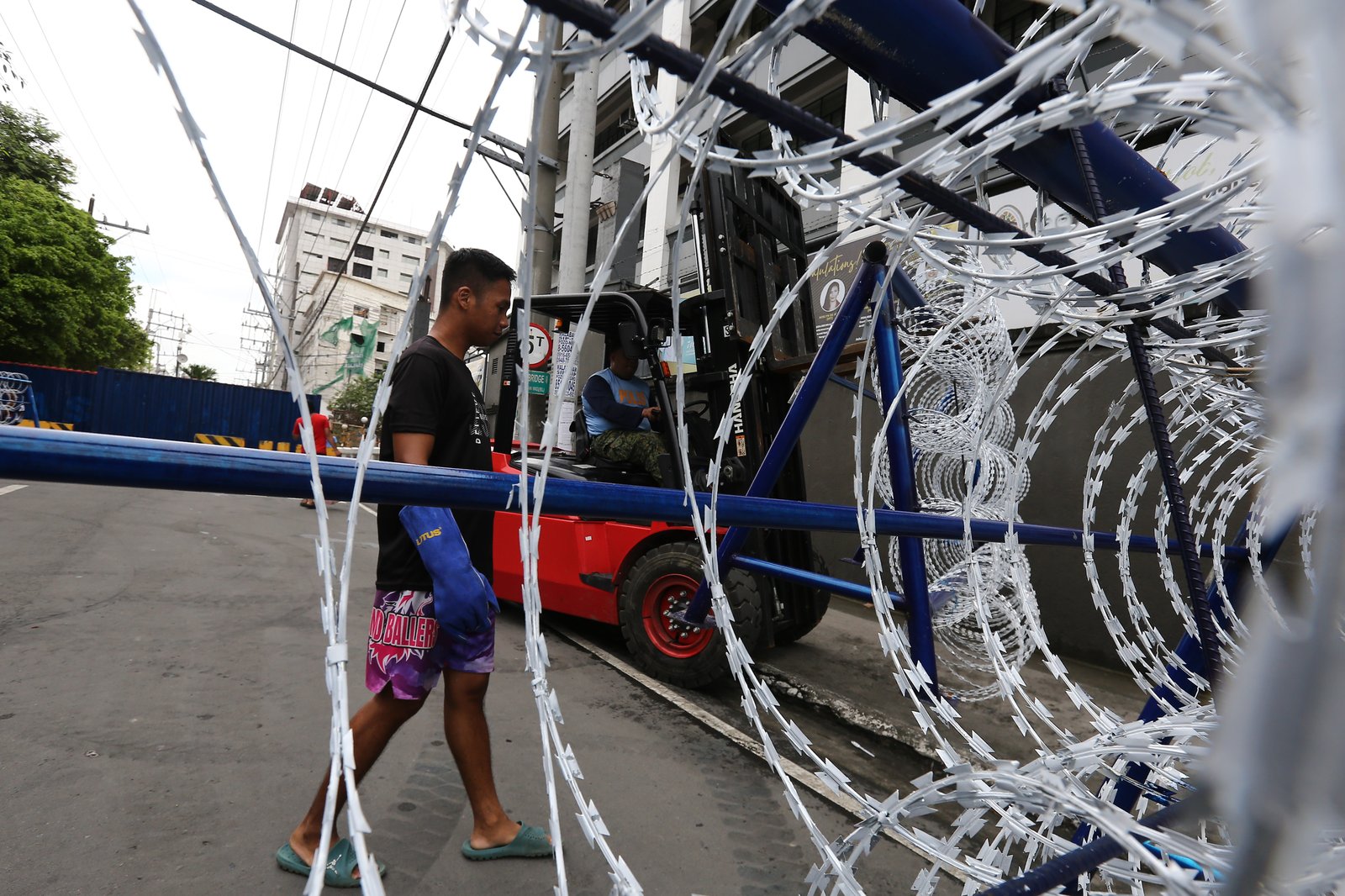 Police personnel install razor wires, concrete barriers, and container vans in various streets leading towards Malacañang compound in Manila on 15 November 2025, in preparation for the upcoming anti-corruption protests.

The following streets, General Solano, Nicanor Padilla, Arlegui, and Mendiola, are no longer accessible to motorists.