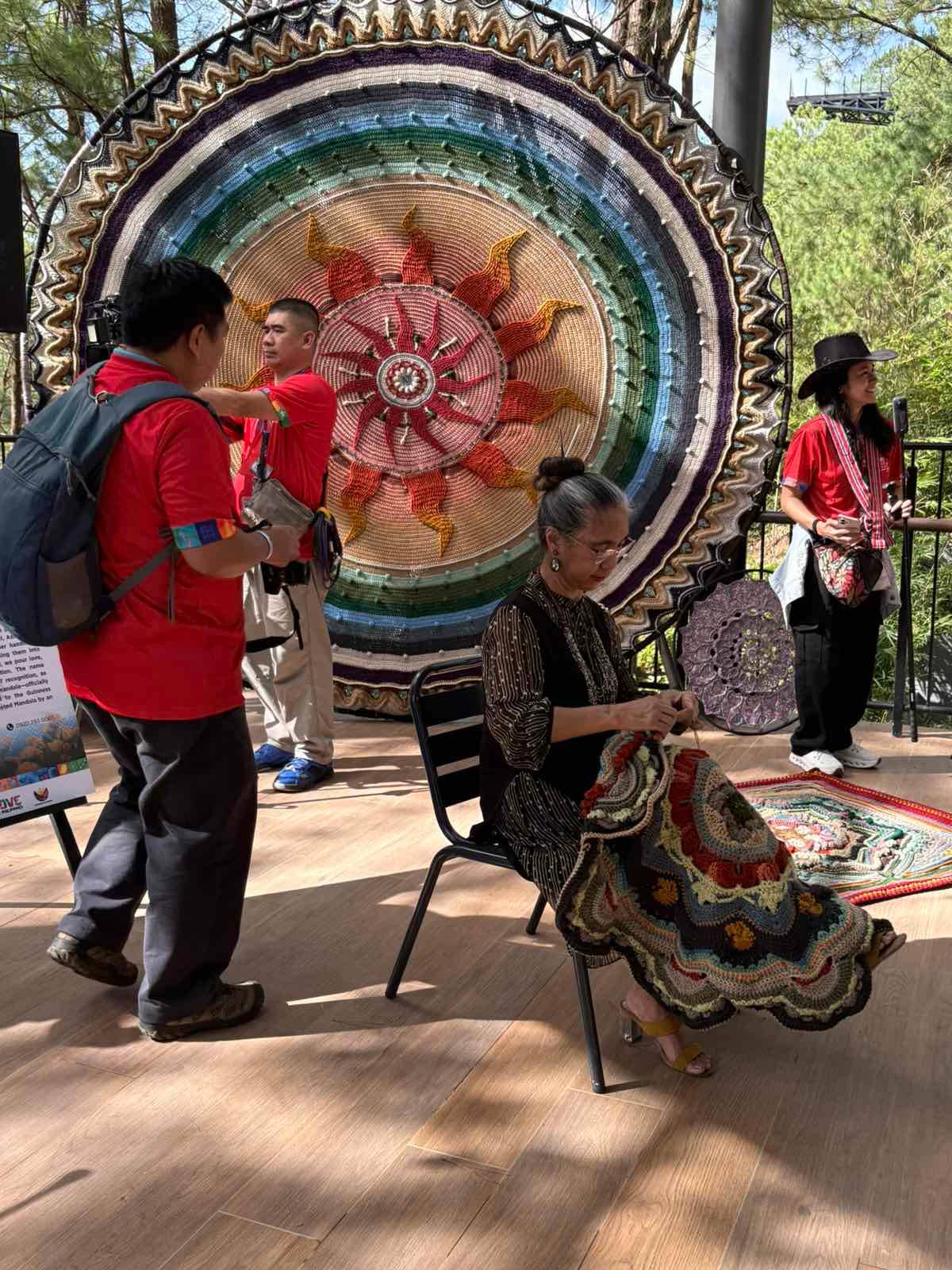 Queen of weaved mandalas Adelaida Guia is one of the featured artists in Mount Camisong. She is known for weaving giant mandals and she attempted to make the biggest weaved mandala called the Wishing Star.