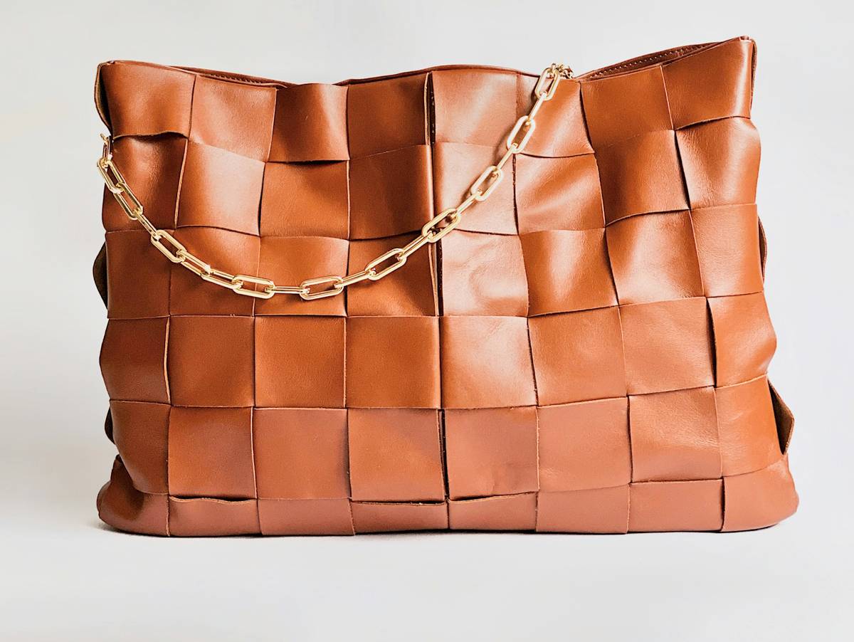 IT’s in the details. One way to tell if a bag is fake is to check the leather.