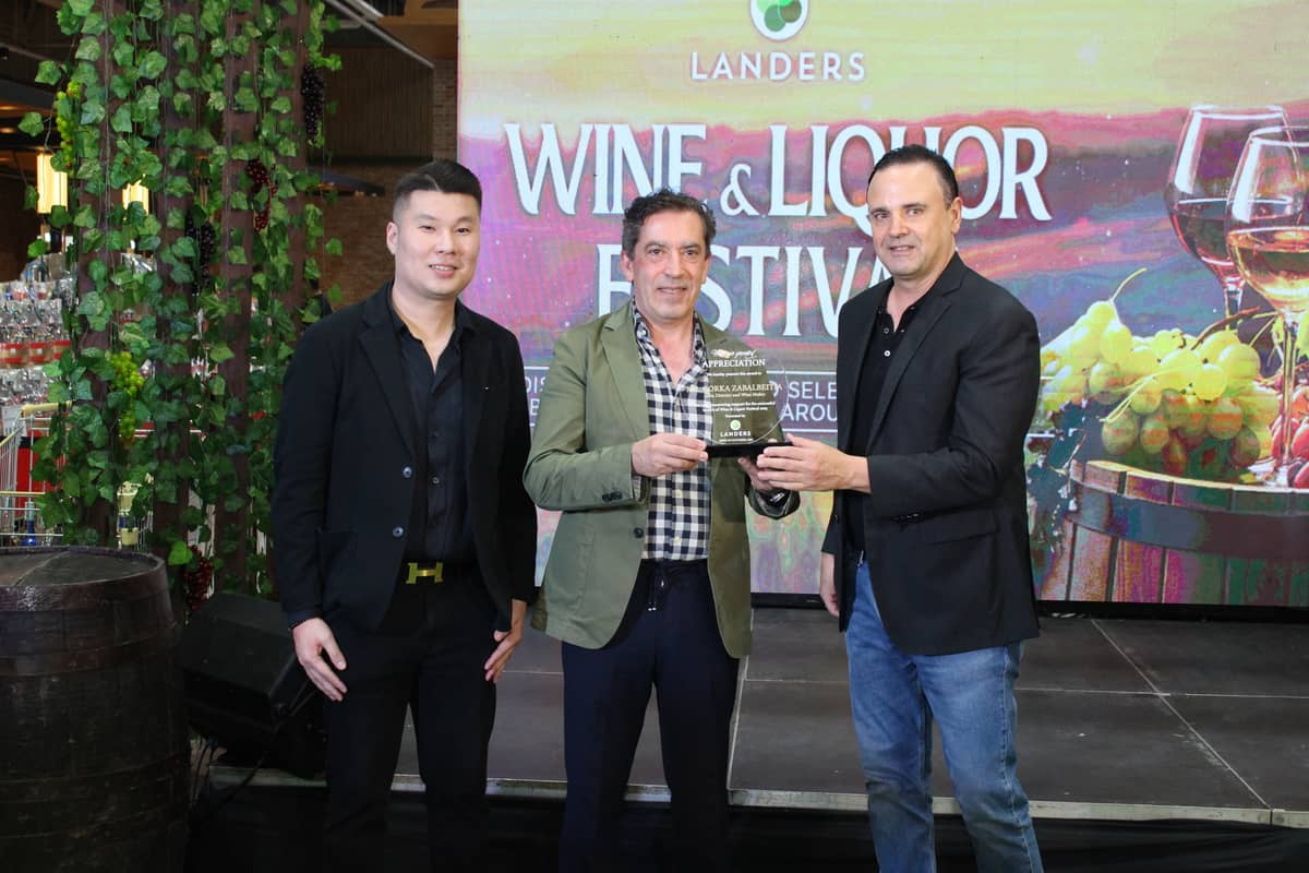 Giving appreciation to a special wine masterclass at the Landers Wine & Liquor Festival 2025 in Landers Vermosa.(L–R) Landers VP for Marketing and Membership Kenneth Ocampo, Spanish winemaker Gorka Zabalbeitia of Tomevinos Family Estates, and Landers Superstore CEO Bill Cummings.
