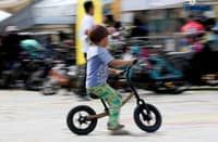 Bike enthusiasts tried bamboo bikes at a bike bazaar at Quezon City Hall days before the celebration of National Bicycle Day.
National Bicycle Day in the Philippines is observed on the fourth Sunday of November, as declared by Proclamation No. 1052, s. 2020. It is celebrated to promote cycling as an eco-friendly form of transportation and to highlight its benefits for public health and the environment.
The event took place on 21 November 2025.