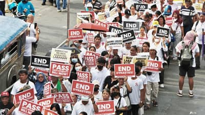 Anti-corruption march Progressive and faith-based groups parade through the Ortigas Central Business District on Sunday to call for an end to corruption and political dynasties.