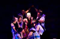 Maita Ponce as Mephistopheles, with the ensemble of "Si Faust."