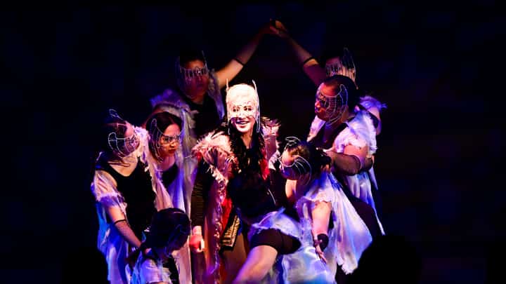 Maita Ponce as Mephistopheles, with the ensemble of "Si Faust."