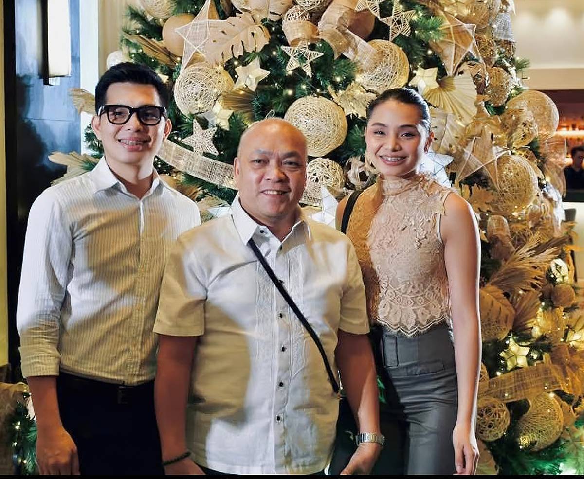 Bhoy Mendoza of the Freeman with Jonathan Choa and Hannah Choa of Chocolate Chamber.
