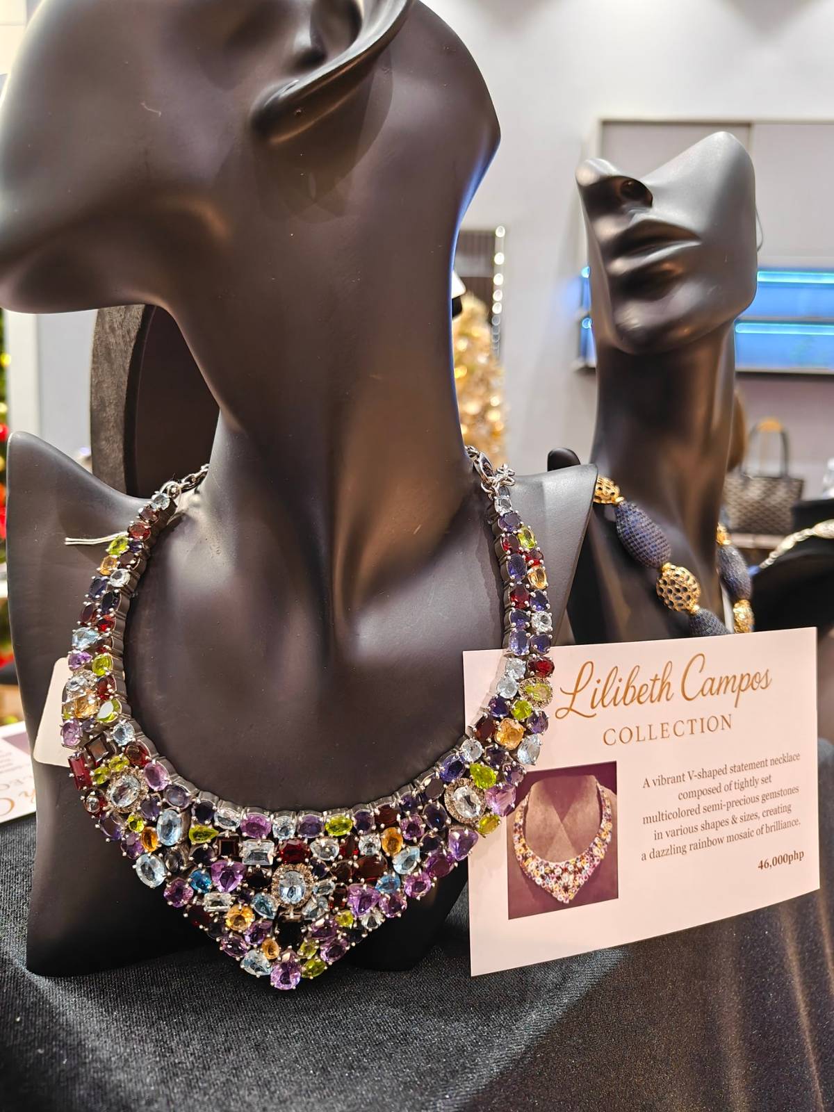 Lilibeth Campos highlights her artistry with a necklace filled with colorful semi-precious stones that instantly catch the eye.