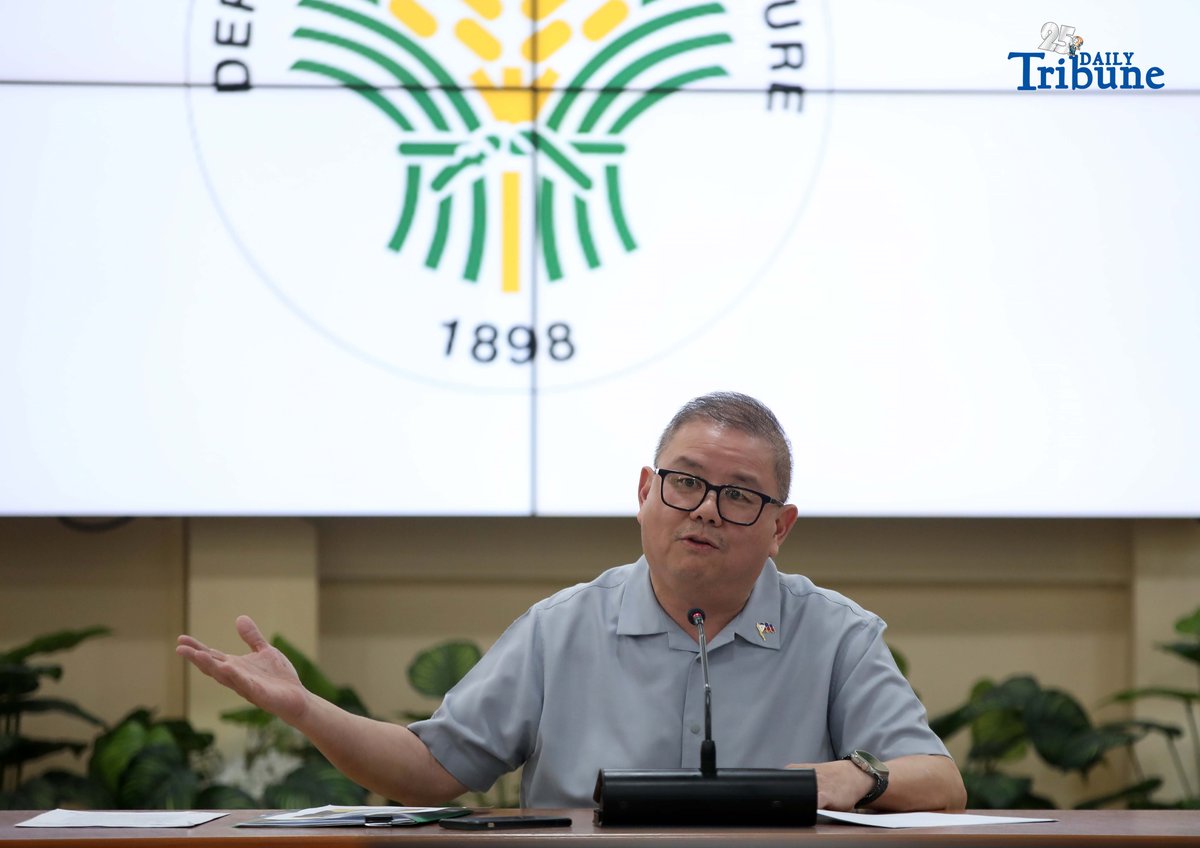 Agriculture Secretary Francisco Tiu Laurel Jr. shows a photocopy of his text exchange with former congressman Zaldy Co — along with a confidential report for Congress — in response to Co’s allegations of “price and import manipulation” of sugar, onion, rice, and fish. Tiu also denied claims that Co influenced the reduction of rice tariffs from 35 percent to 15 percent. The secretary refuted all accusations during a press conference at the Department of Agriculture office in Quezon City on Thursday. Photo by Analy Labor