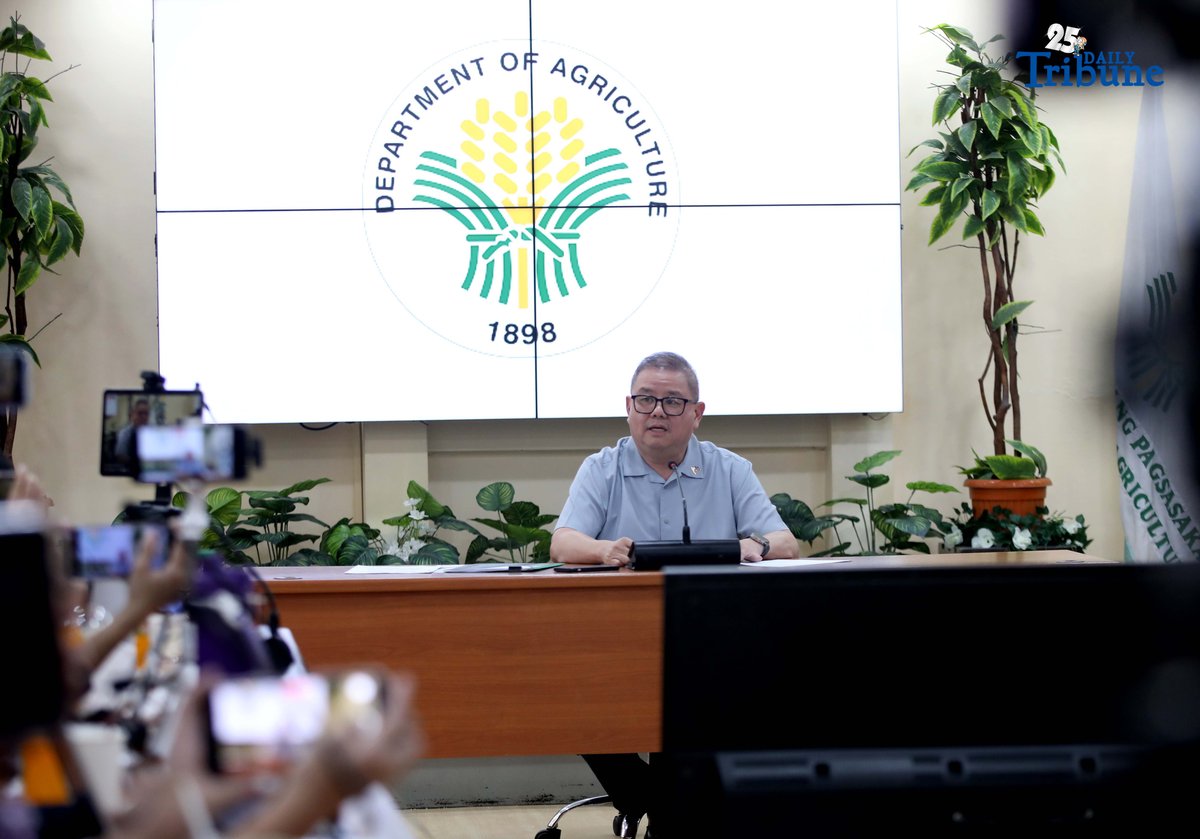 Agriculture Secretary Francisco Tiu Laurel Jr. shows a photocopy of his text exchange with former congressman Zaldy Co — along with a confidential report for Congress — in response to Co’s allegations of “price and import manipulation” of sugar, onion, rice, and fish. Tiu also denied claims that Co influenced the reduction of rice tariffs from 35 percent to 15 percent. The secretary refuted all accusations during a press conference at the Department of Agriculture office in Quezon City on Thursday. Photo by Analy Labor
