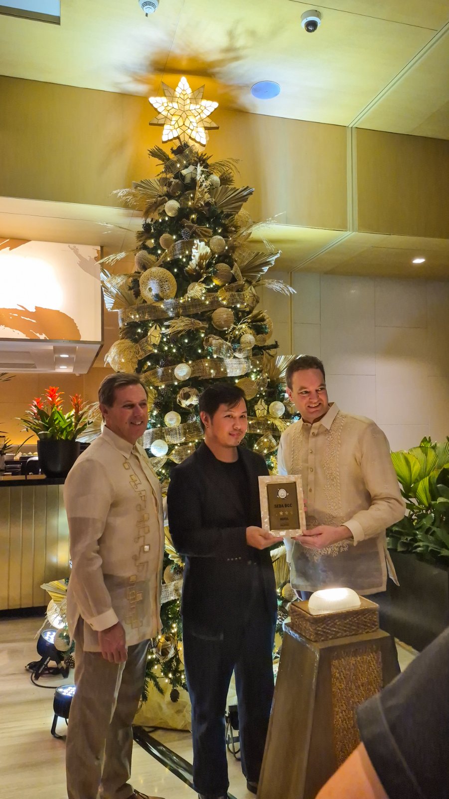 General Manager of Seda BGC Emile Otte as he recieves the four star plaque
