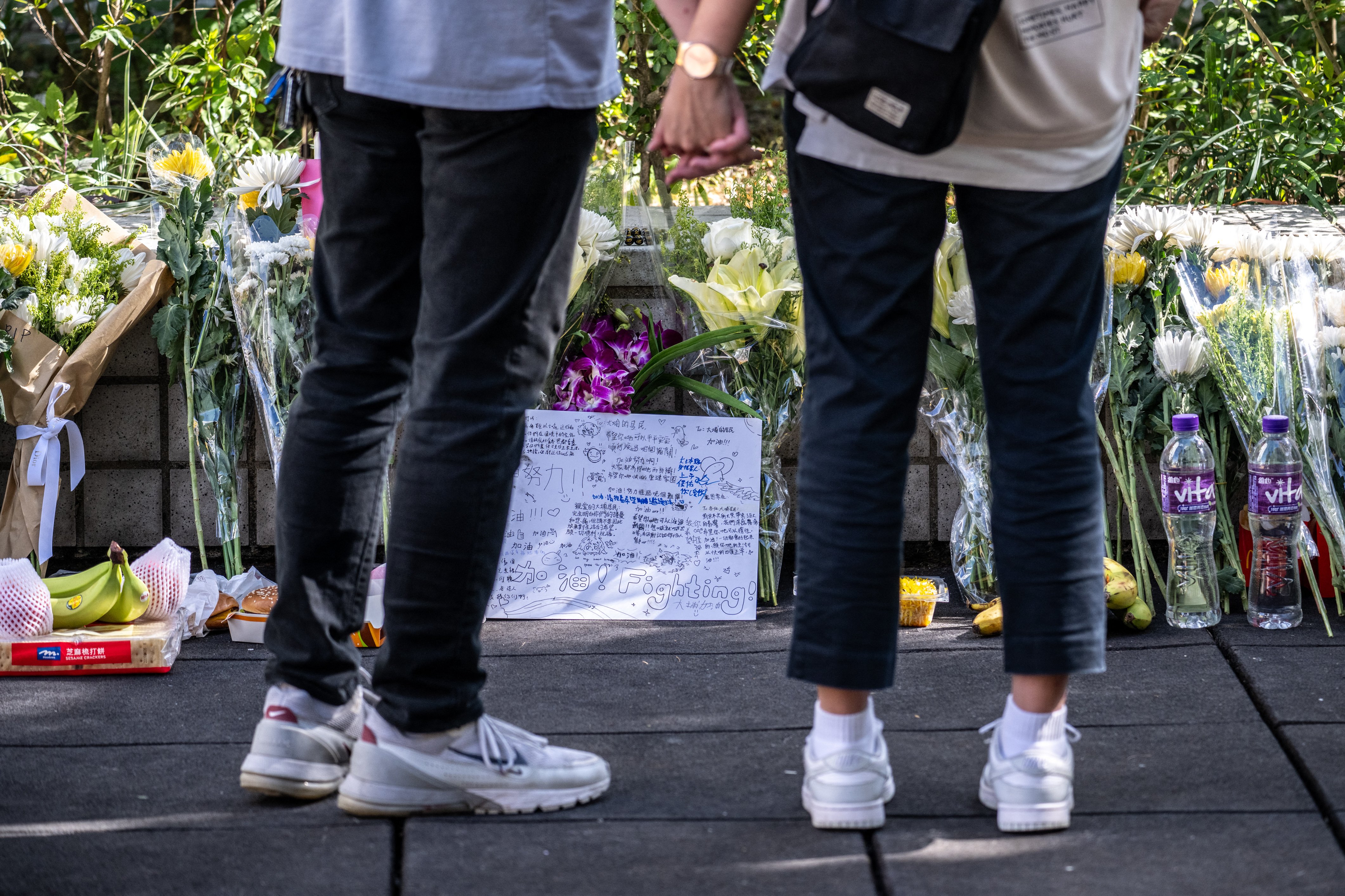 Hong Kong begins mourning period after fire kills at least 128