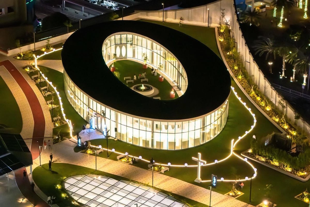 Surrounded by giant rosary beads — a symbol of faith and devotion in the heart of SM Mall of Asia.