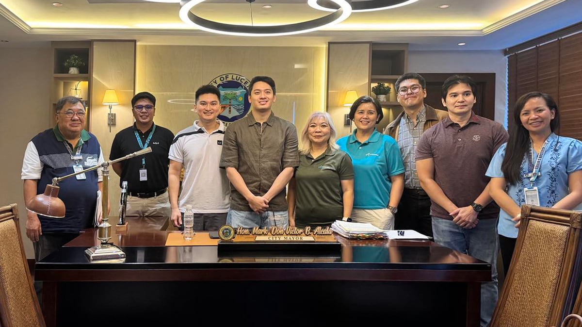 LUCENA officials and ACMobility representatives meet at city hall to mark the opening of the new EV charging station. Shown are (from left): Atty. Euclides Forbes, City Mayor’s Office operations supervisor; Christian Balongo, Kia BGC sales consultant; Giordan Almendras, director of Almonds Group of Companies; Mark Alcala, mayor of Lucena City; Yvonne Castro, Regulatory and Government Affairs officer; Elise Tinio, account manager of Mobility Infrastructure; Dennis Betito, Government Projects manager; Grant Almendras, director of Almonds Group of Companies and Tina Ederon, City Assessor’s head.