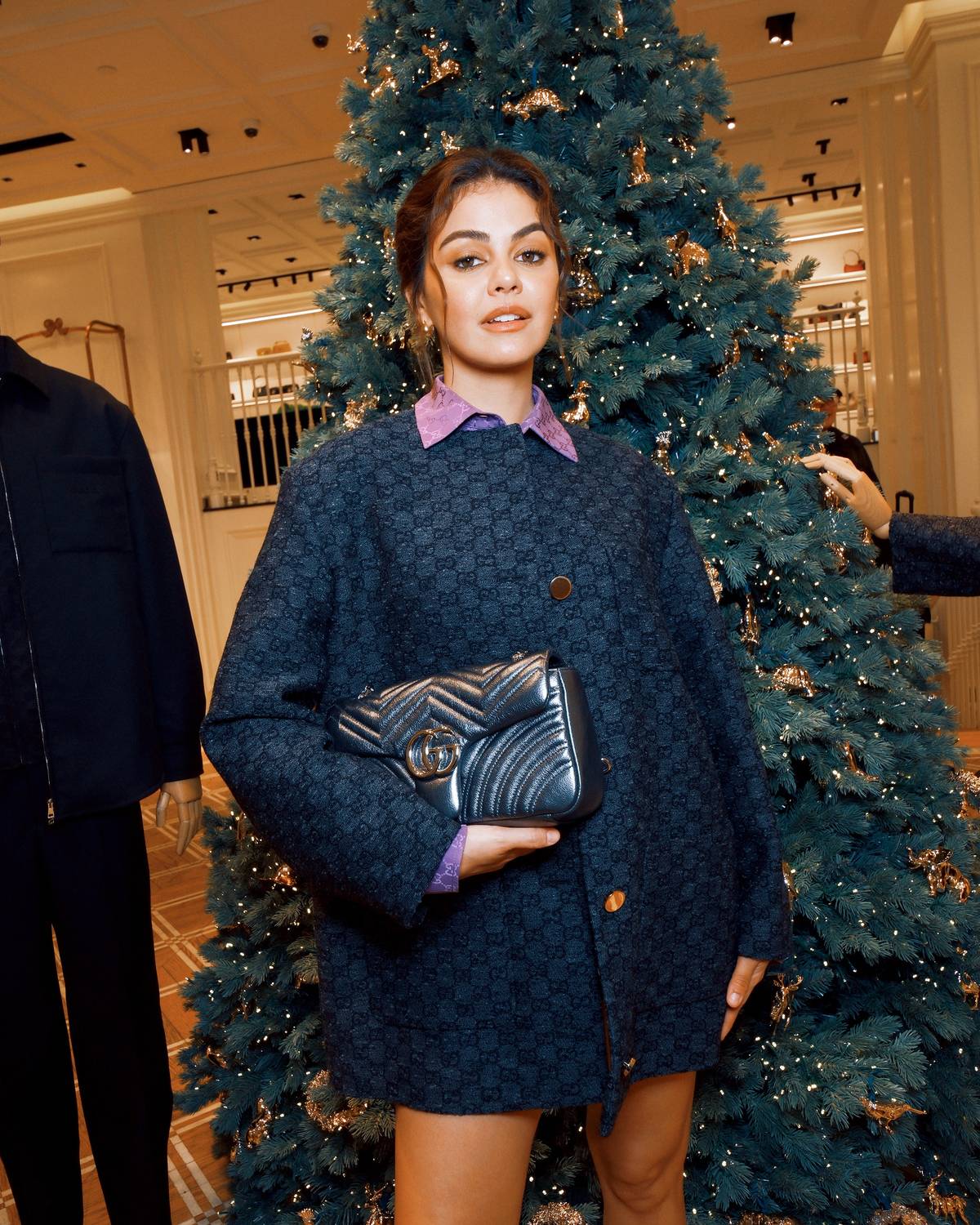 Janine Gutierrez wore a Gucci Cruise 2026 GG boutonné wool tweed jacket, GG silk jacquard oversized shirt, GG boutonné wool tweed skirt, GG Marmont medium shoulder bag, and women's pump with crystal Interlocking.
