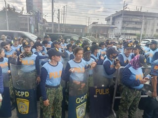 Police outnumber protesters at People Power Monument rally