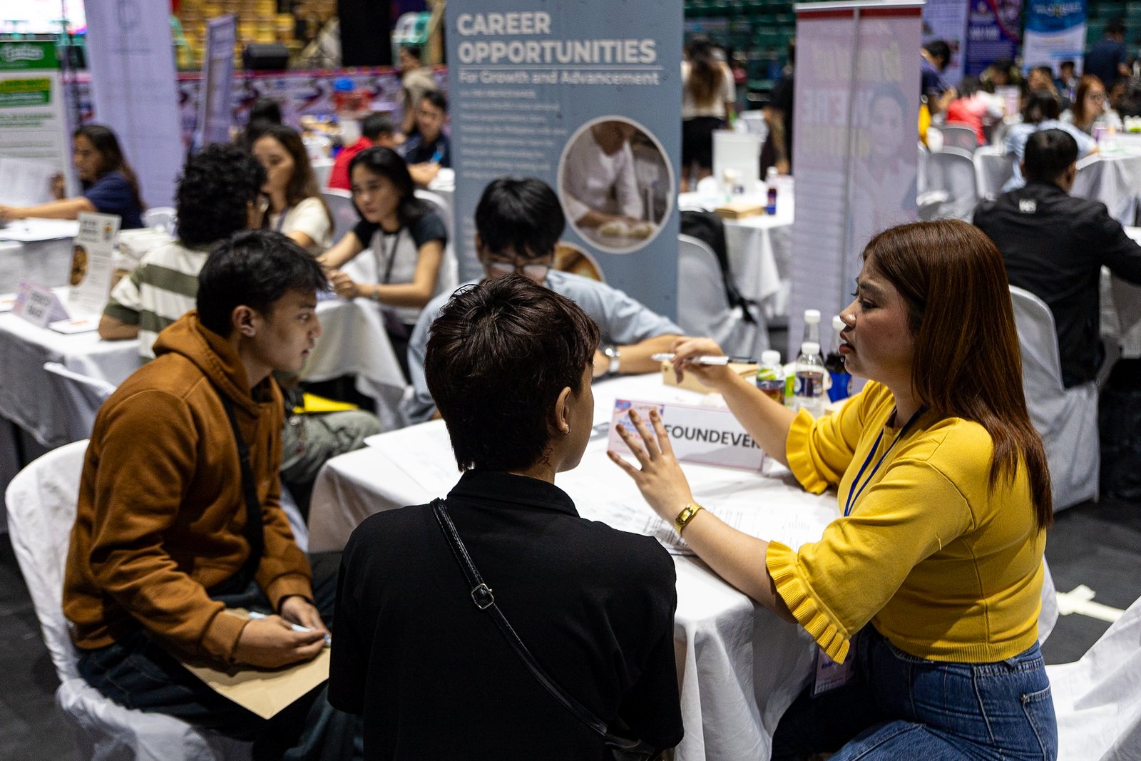 Jobseekers line up to apply for positions during the “Mega Job Fair: Trabaho Para sa Pasayeño” at the Cuneta Astrodome in Pasay City on Monday, 1 December 2025, held in celebration of the city’s 162nd founding anniversary.

Organized by the Pasay City government in partnership with the Department of Labor and Employment, the fair offers opportunities with 46 local employers, as well as applications for four overseas job openings and several government positions.