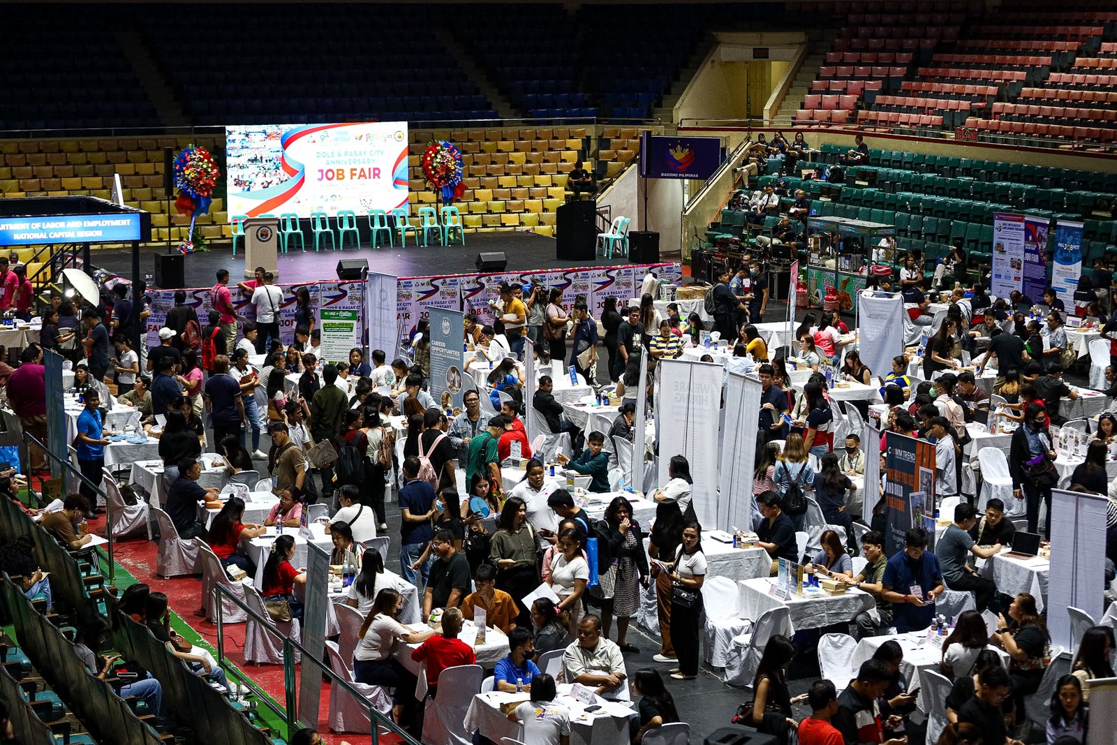 Jobseekers line up to apply for positions during the “Mega Job Fair: Trabaho Para sa Pasayeño” at the Cuneta Astrodome in Pasay City on Monday, 1 December 2025, held in celebration of the city’s 162nd founding anniversary.

Organized by the Pasay City government in partnership with the Department of Labor and Employment, the fair offers opportunities with 46 local employers, as well as applications for four overseas job openings and several government positions.
