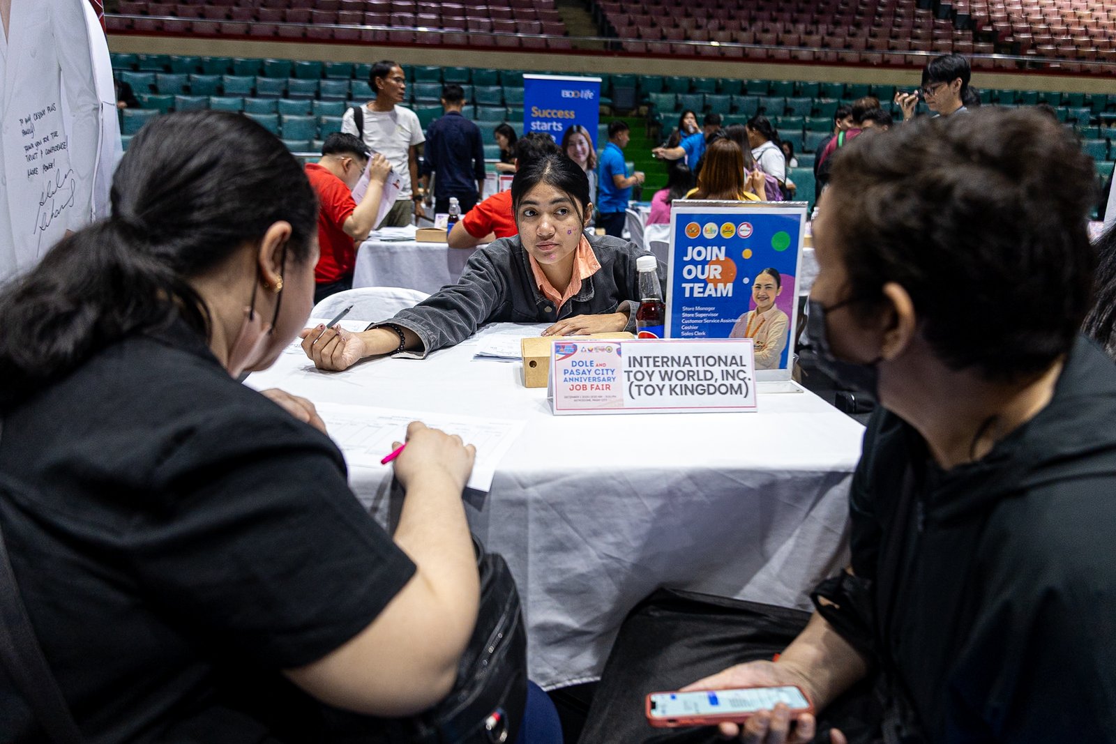 Jobseekers line up to apply for positions during the “Mega Job Fair: Trabaho Para sa Pasayeño” at the Cuneta Astrodome in Pasay City on Monday, 1 December 2025, held in celebration of the city’s 162nd founding anniversary.

Organized by the Pasay City government in partnership with the Department of Labor and Employment, the fair offers opportunities with 46 local employers, as well as applications for four overseas job openings and several government positions.