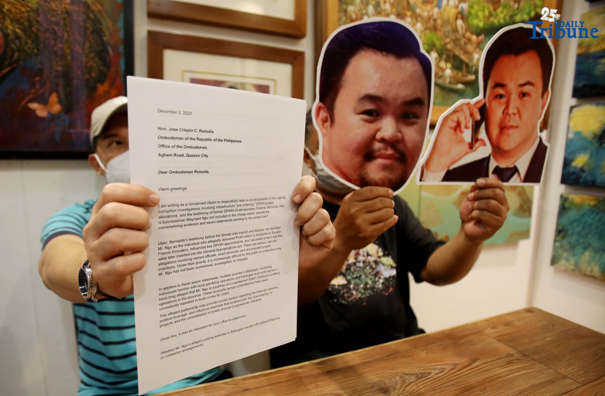 (December 02 2025) A concerned private citizen shows their Call to Action letter to the media during a press conference, as they submit to the Office of the Ombudsman in Quezon City on Tuesday  December 2 2025. The letter urges the Ombudsman to investigate the alleged connection of former special envoy to China Maynard Ngu to some senators and congressmen on anomalous Department of Public Works and Highways (DPWH) project interventions and kickbacks which was detailed DPWH Undersecretary Roberto Bernardo during hearings. Photo/Analy Labor