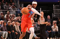 Shai Gilgeous-Alexander powers the Oklahoma City Thunder to a 124-112 win over the Golden State Warriors for their 13th consecutive victory in the NBA regular season.