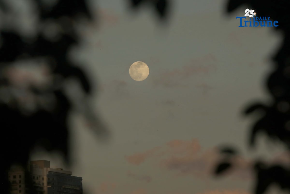 THE Cold SuperMoon seen rising from Quezon City on Thursday, 04 December 2025. The moon appears up to 10 percent larger and much brighter than usual. It will be around 17,000 miles (27,300 kilometers) closer to Earth. This supermoon is also known as a "cold" full moon because it marks the start of colder, darker months ahead.