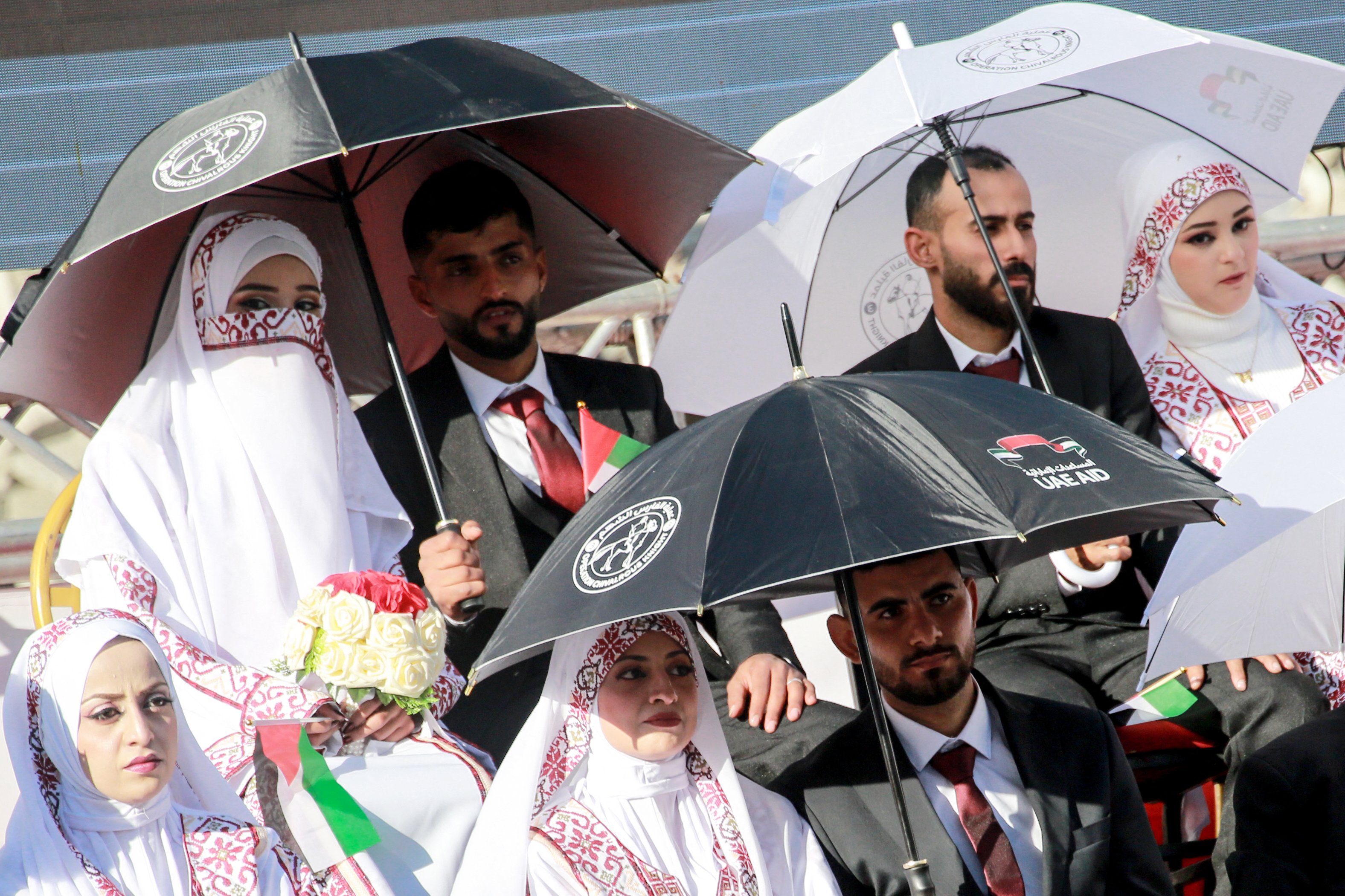 54 couples wed amid ruins