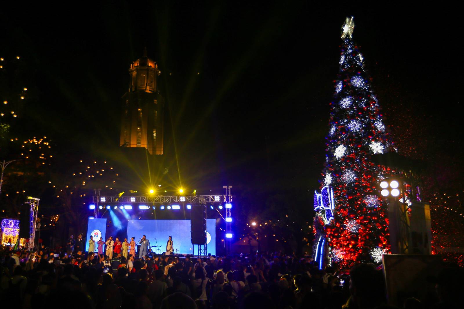 Manila City Mayor Francisco "Isko" Moreno, together with Vice-Mayor Angela Lei "Chi" Atienza, leads the unveiling of a commemorative stamp and lighting of a Christmas tree at the Kartilya ng Katipunan in Manila Friday evening to officially start the city-wide Christmas celebration.