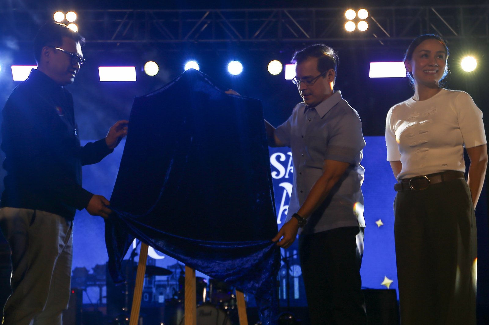 Manila City Mayor Francisco "Isko" Moreno, together with Vice-Mayor Angela Lei "Chi" Atienza, leads the unveiling of a commemorative stamp and lighting of a Christmas tree at the Kartilya ng Katipunan in Manila Friday evening to officially start the city-wide Christmas celebration.