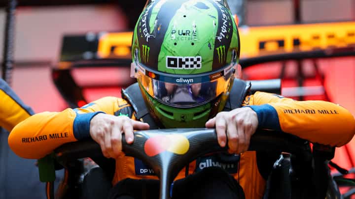 PREPARATIONS begin as Lando Norris settles into his McLaren in Las Vegas.