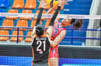 SAM Tiratira of Biñan challenges the defense of Zam Nolasco of Quezon during Game 3 of their MPVA best-of-three semifinal series late Friday at the Filoil EcoOil Centre in San Juan.