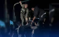 Soldiers load into a truck the body of a fallen comrade during a clash in San Jose de Buan, Samar, on Dec. 3, 2025. The Philippine Army’s 8th Infantry Division has condemned the New People’s Army for what it described as “heinous violations” of International Humanitarian Law (IHL), following the recent armed encounter that killed two soldiers. (Photo from FB page of Kiss FM 103.7 Catarman)