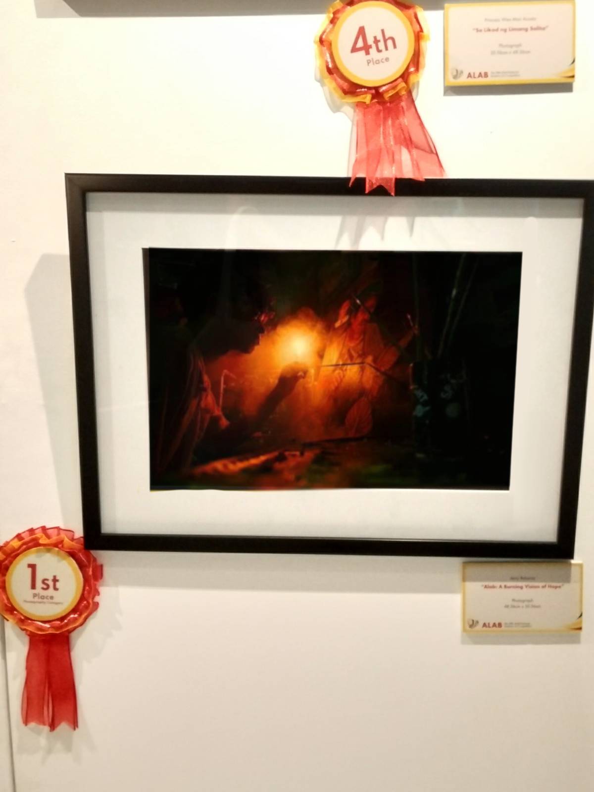 “Alab: A Burning Vision of Hope” by Jerry Balanay won first place in the Photography category. Balanay said his love for art persisted despite the high cost of materials, and photography allowed him to create by borrowing cameras from others.