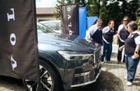 VISITORS take a closer look at the Volvo XC60 on display during the tournament.