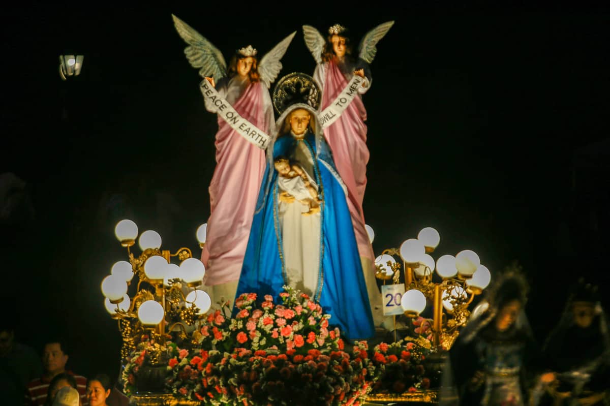 HUNDREDS of devotees gather and join the Grand Marian Procession inside the ‘Walled City,’ Intramuros, Manila, on the eve of the Feast of the Immaculate Conception, Sunday. Images of the Virgin Mother from various churches in Metro Manila and nearby provinces join the procession in honor of their Patroness.