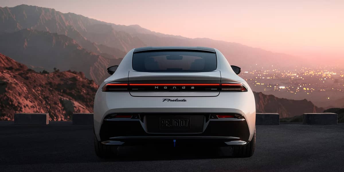 REAR profile of the Prelude highlights its sleek fastback lines against the evening backdrop.