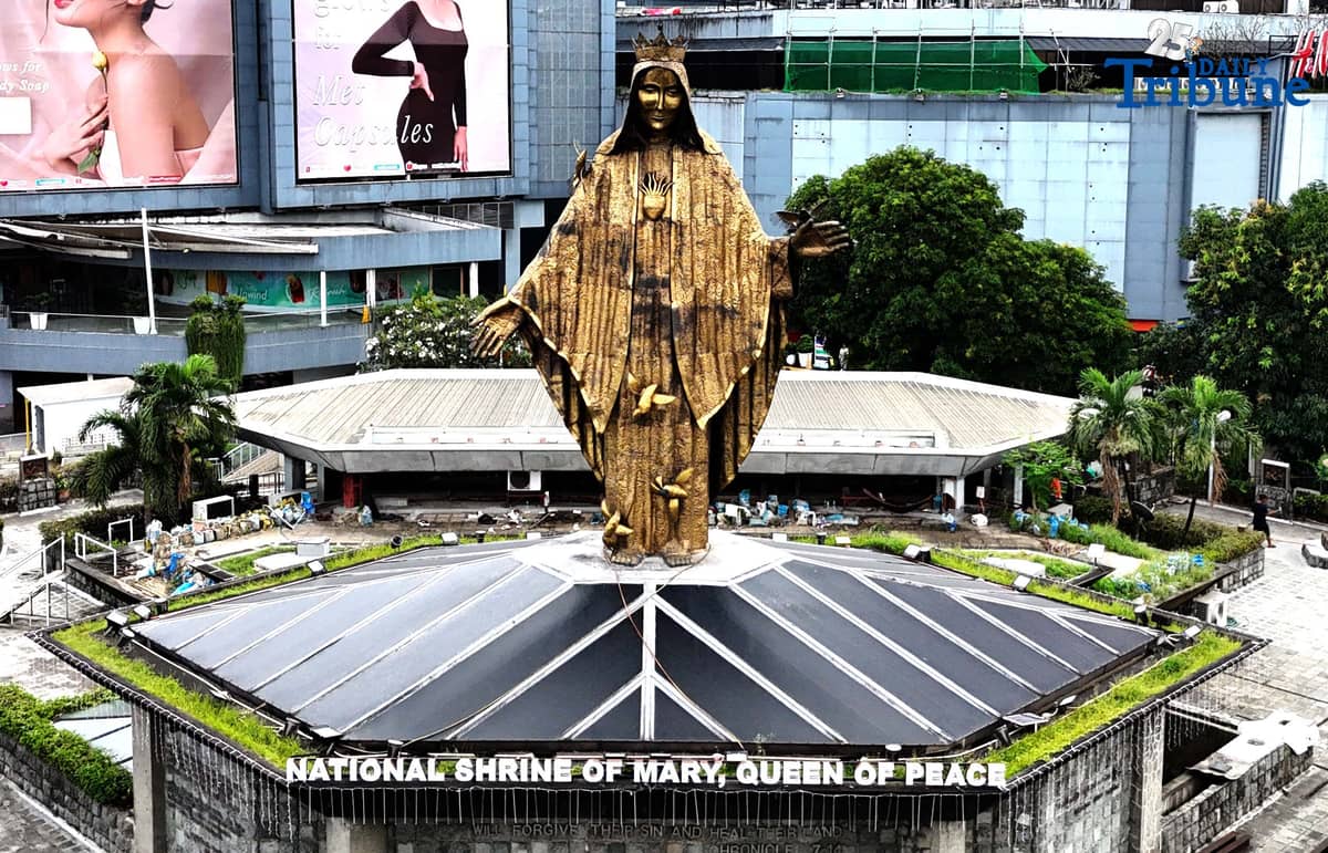 (December 07 2025) The 35-foot bronze sculpture of the Our Lady of EDSA situated on top of the National Shrine of Mary, Queen of Peace, also known as the EDSA Shrine, towers over the busy thoroughfare at the corner of EDSA and Ortigas Avenue in Quezon City on Sunday as the country is set to celebrate the Feast of the Immaculate Conception of Mary on December 8, which is a special non-working holiday declared by the government. Photo/Analy Labor