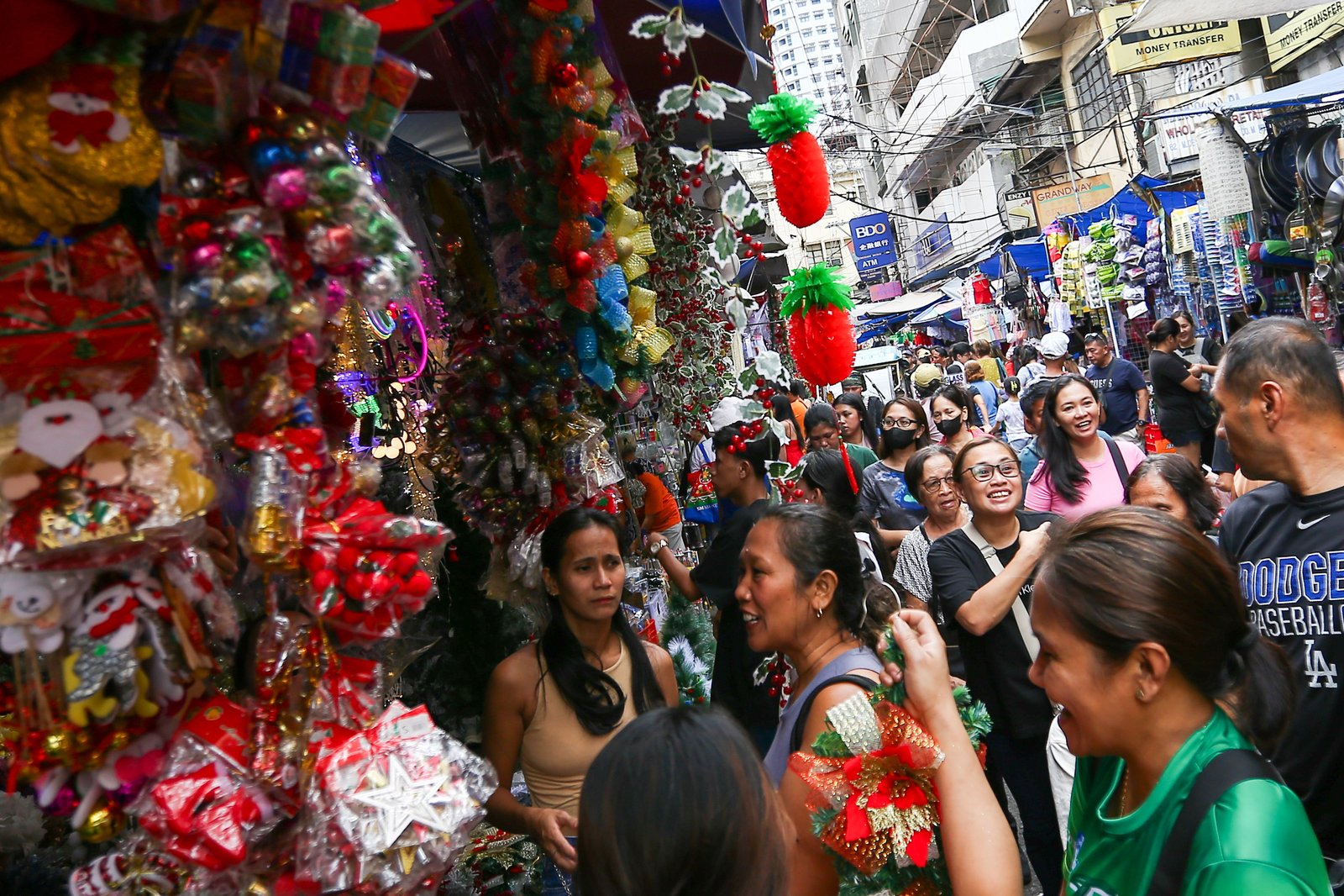 Shoppers flock to Divisoria in Manila on Sunday, 07 December 2025, as the holiday rush builds with Christmas fast approaching.